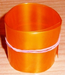 Krimpkous PVC Accupack 2:1 95mm plat rond 60mm ORANGE  0,2M